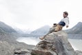 A man at Tasman Glacier viewpoint, Aoraki / Mount Cook National Park, New Zealand